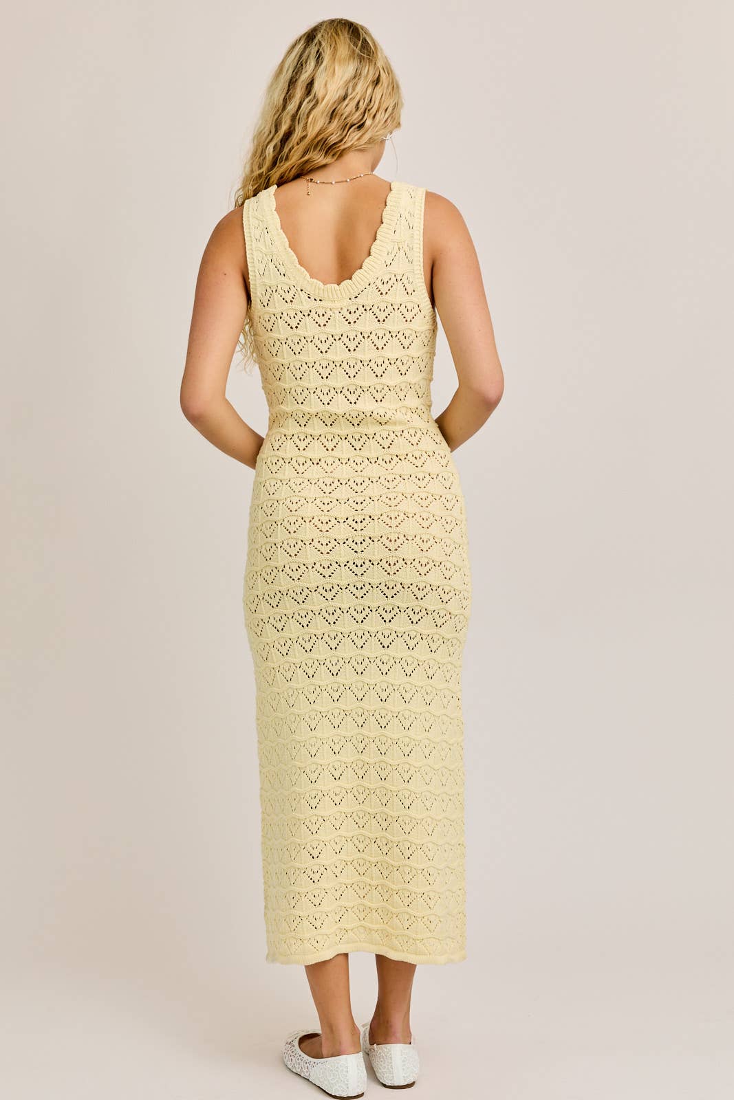 SCOOPED NECKLINE WITH RIBBON BOW DETAIL ON THE FRONT