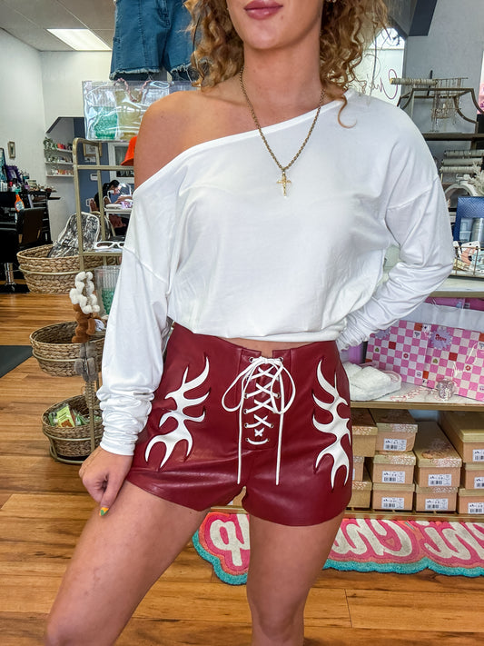 VEGAN LEATHER LIGHTNING CUT OUT SHORTS